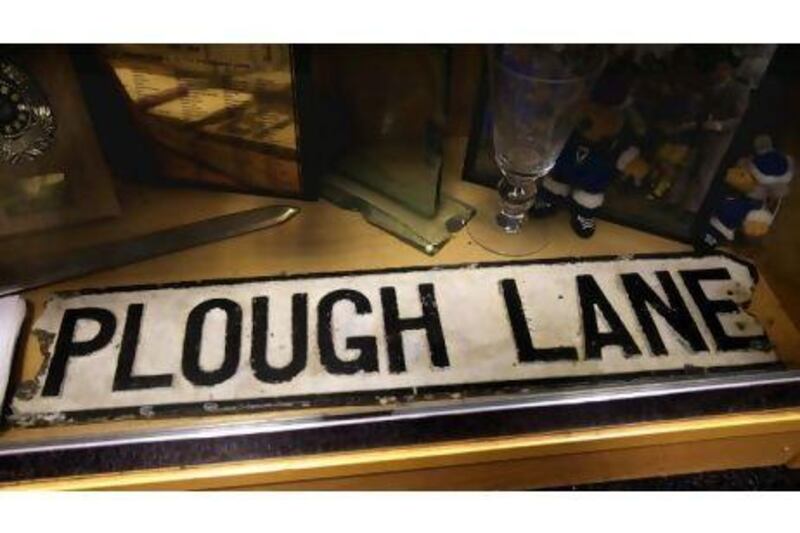ENGLAND. 12th January 2011. The Plough Lane street sign, the name of AFC Wimbledon's former ground inside the trophy cabinet at their new stadium in Kingston upon Thames, England. FOR SPORT. words: Rob Shepherd. Stephen Lock for The National
