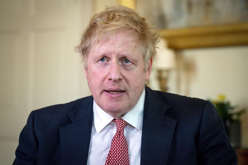 (FILES) In this file photo taken on April 12, 2020 A handout image released by 10 Downing Street, shows Britain's Prime Minister Boris Johnson as he delivers a television address after returning to 10 Downing Street after being discharged from St Thomas' Hospital, in central London on April 12, 2020. Prime Minister Boris Johnson is expected to return to work soon after his recovery from COVID-19, as pressure mounts on his government to explain how to get Britain out of lockdown. Johnson, 55, has been recuperating at the British prime ministerial retreat, Chequers, outside London since his release from hospital on April 12.
 - RESTRICTED TO EDITORIAL USE - MANDATORY CREDIT "AFP PHOTO / 10 DOWNING STREET / PIPPA FOWLES" - NO MARKETING - NO ADVERTISING CAMPAIGNS - DISTRIBUTED AS A SERVICE TO CLIENTS
 / AFP / 10 Downing Street / Pippa FOWLES / RESTRICTED TO EDITORIAL USE - MANDATORY CREDIT "AFP PHOTO / 10 DOWNING STREET / PIPPA FOWLES" - NO MARKETING - NO ADVERTISING CAMPAIGNS - DISTRIBUTED AS A SERVICE TO CLIENTS
