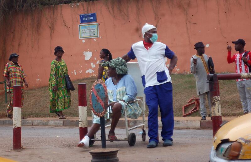 A male nurse wears a face mask in Yaounde, Cameroon.  EPA