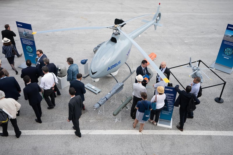 Attendees inspect an Airbus VSR700 unmanned reconnaissance helicopter, manufactured by Airbus Helicopters SA Jasper Juinen / Bloomberg