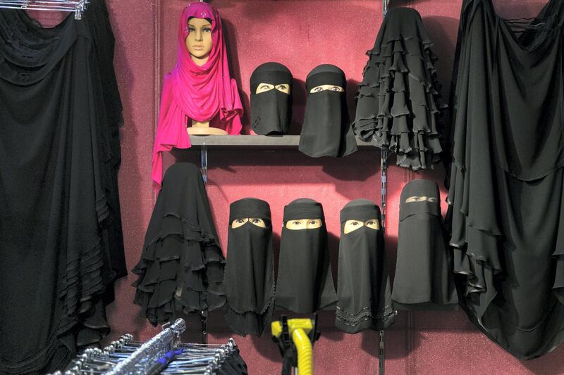 RAS AL KHAIMAH, UNITED ARAB EMIRATES - AUGUST 13, 2018. 

Niqabs for sale at Ras Al Khaima's Eid Al Adha fair.

(Photo by Reem Mohammed/The National)

Reporter: RUBA HAZA
Section:  NA