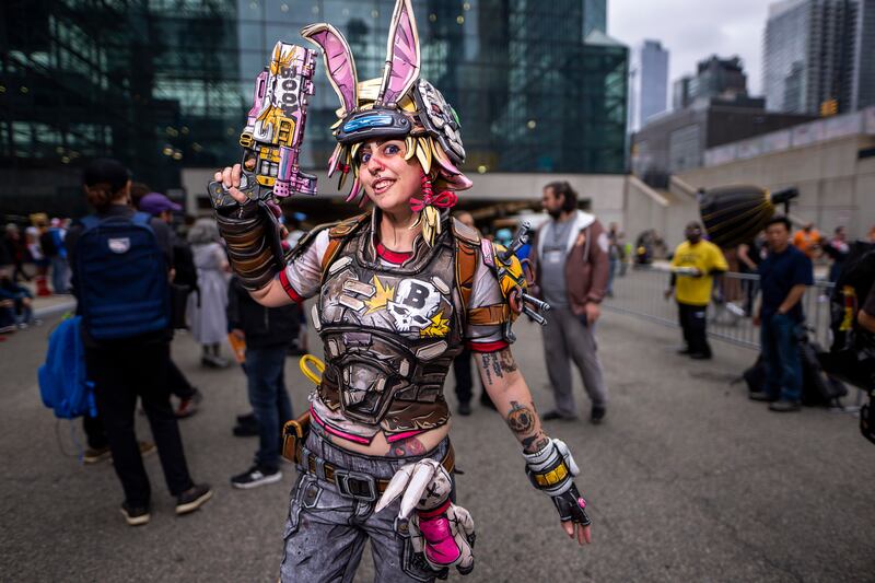 A costumed attendee poses during New York Comic Con. Charles Sykes / Invision / AP