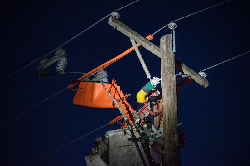 Oncor apprentice lineman Brendan Waldon carried out repairs in Odessa, Texas.  AP