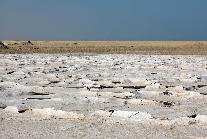 ABU DHABI - 18NOV2010 - Abu Dhabi coastal salt flats known as Sabkhas formed on either side of the road towards Liwa. Ravindranath  K / The National 