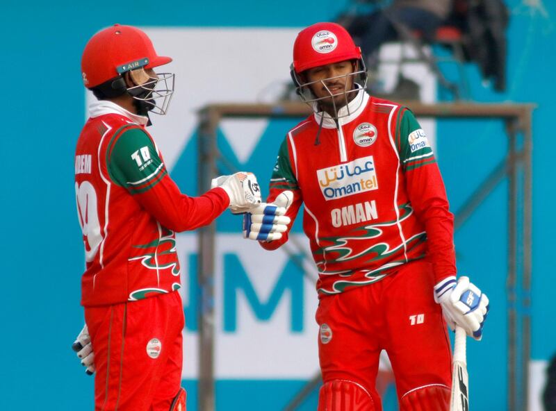 Mohammad Nadeem (L) and Aqib Ilyas of Oman during the ICC Cricket World Cup League 2 match between USA and Oman at TU Cricket Stadium on 6 February 2020 in Nepal (1).JPG
