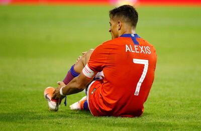 Soccer Football - International Friendly - Chile v Colombia - Estadio Jose Rico Perez, Alicante, Spain - October 12, 2019  Chile's Alexis Sanchez reacts on the ground  REUTERS/Javier Barbancho
