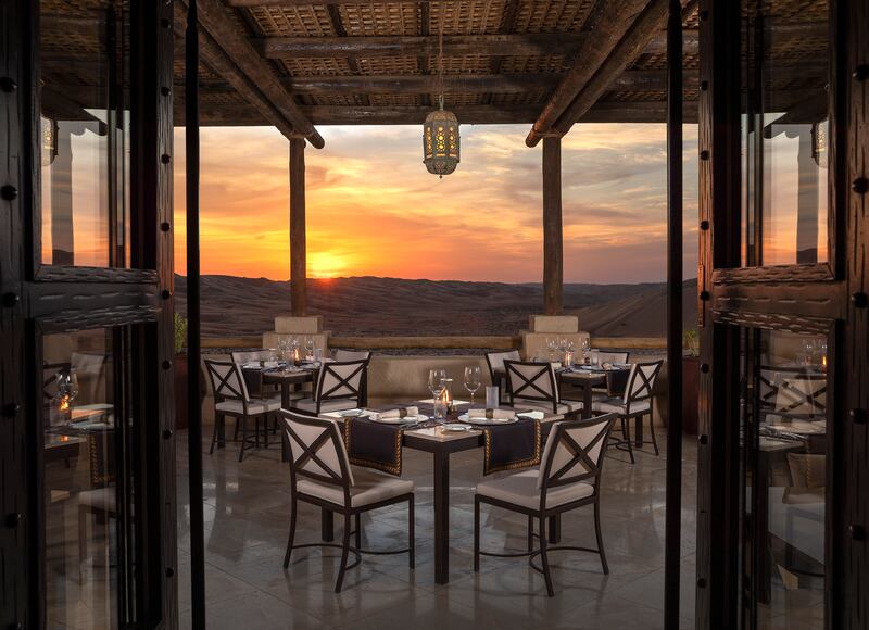 Upscale steakhouse Suhail has an open-air terrace, with desert views