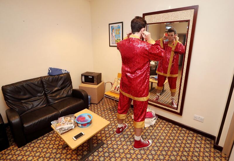 Dubai, United Arab Emirates - December 19, 2018: Hadley Smith who plays Wishee Washee does some last minute prep. The Madinat Theatre is putting on the pantomime Aladdin over the Xmas holidays. Wednesday the 19th of December 2018 at the Madinat Theatre, Dubai. Chris Whiteoak / The National