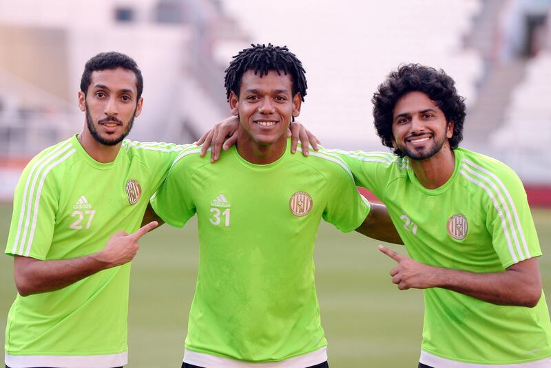 Al Jazira's Romarinho, centre, was held in Qatar for 24 hours following a dispute relating to his former team. Courtesy: Al Jazira Club