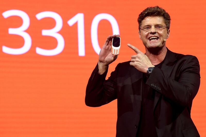 HMD chief executive Arto Nummela presents his company’s new ‘old’ phone, the Nokia 3310. Josep Lago / AFP