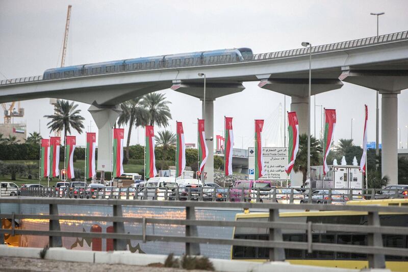 Dubai, United Arab Emirates- Omani flags on display at Sheikh Zayed Road roundabout.  Leslie Pableo for The National
