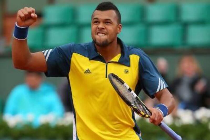 Jo-Wilfried Tsonga of France celebrates set point against Jarkko Nieminen of Finland. Getty Images