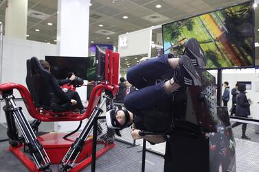 Participants try out virtual reality devices during the Next ICT Convergence Expo in Seoul, South Korea. The advent of 5G will bring about massive change in the devices we use and what they look like and can do. EPA