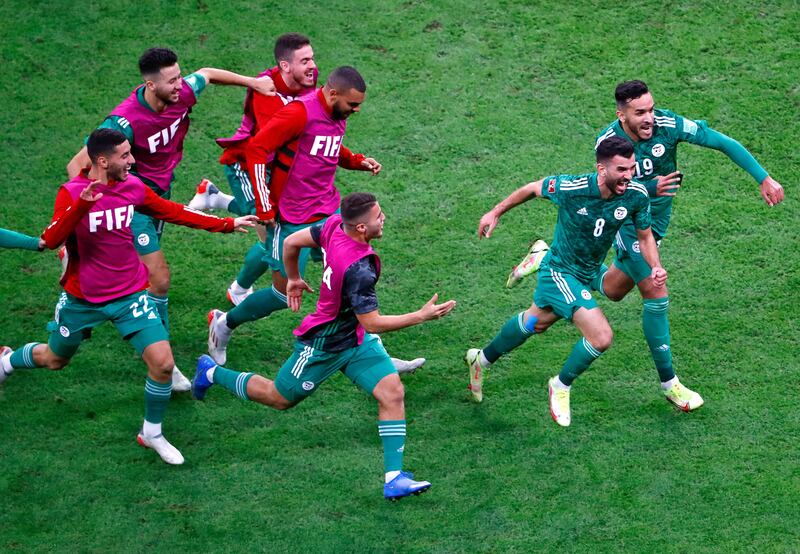 Algeria's Amir Sayoud celebrates with teammates after scoring. AFP