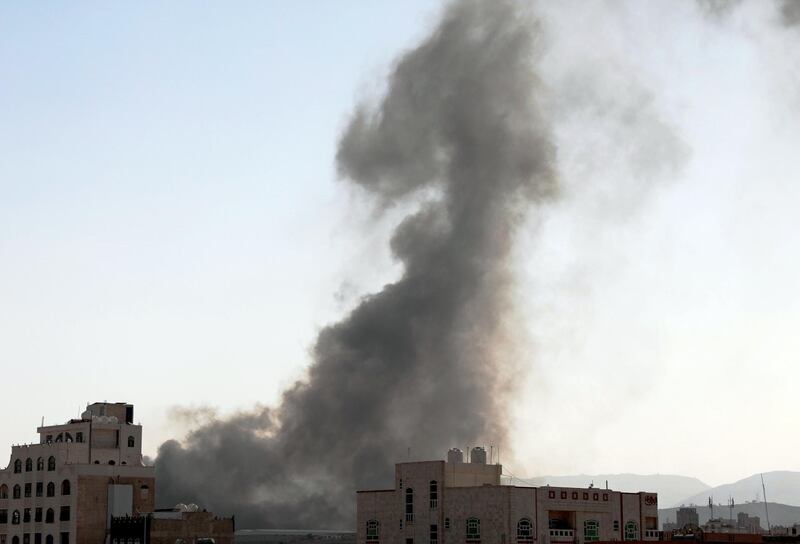 Smoke rises after Saudi-led airstrikes on an army base in Sanaa, Yemen, Sunday, Mar. 7, 2021. The Saudi-led coalition fighting Iran-backed rebels in Yemen said Sunday it launched a new air campaign on the war-torn country‚Äôs capital and on other provinces. The airstrikes come as retaliation for recent missile and drone attacks on Saudi Arabia that were claimed by the Iranian-backed rebels. (AP Photo/Hani Mohammed)