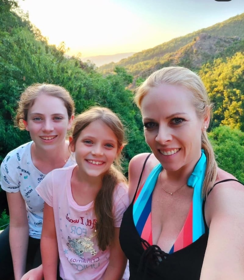 Savannah, left, with her sister Anais and mum Liz.