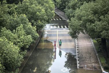 Flooding in the Chinese city of Wuhan, the first to adopt 'spongy' roads. The technology is being used in Slough, England. Getty Images