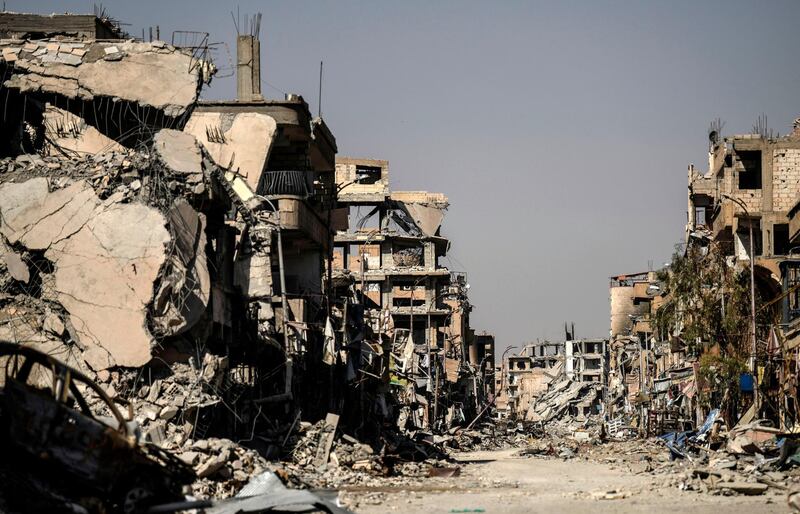 A picture taken on October 21, 2017 shows a general view of heavily damaged buildings in Raqa, after a Kurdish-led force expelled the Islamic State group from the northern Syrian city.
For three years, Raqa saw some of IS's worst abuses and grew into one of its main governance hubs, a centre for both its potent propaganda machine and its unprecedented experiment in jihadist statehood. / AFP PHOTO / BULENT KILIC