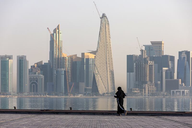 5. A resident jogs along the Doha Corniche. Bloomberg