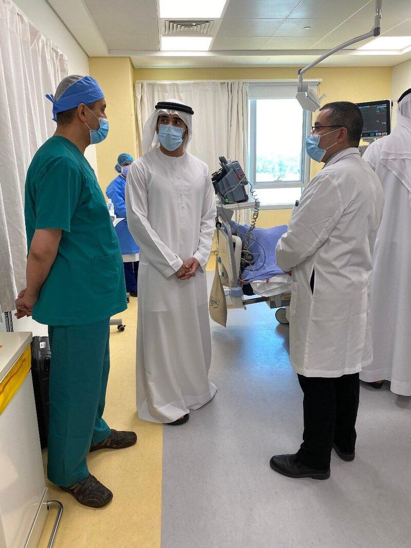 Sheikh Hamdan visited two firefighters in hopsital who were injured in a blaze in Dubai Investments Park on Tuesday. Courtesy: Twitter 