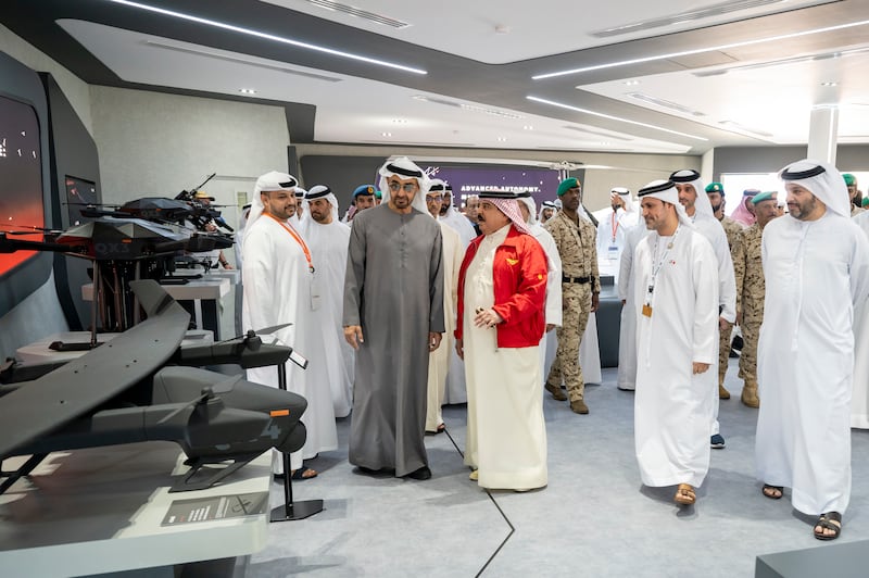 President Sheikh Mohamed and Bahrain's King Hamad visit the Tawazun stand during the Bahrain International Airshow 2022 at Sakhir Air Base. All photos: UAE Presidential Court 
