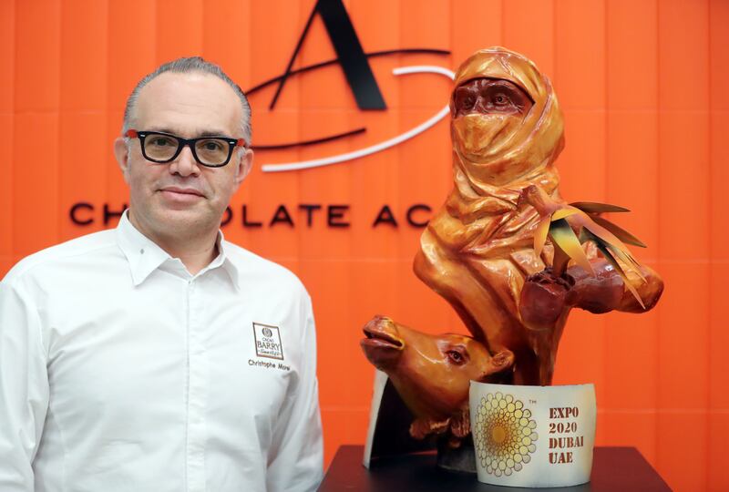 Chef Christophe Morel with one of his chocolate creations.