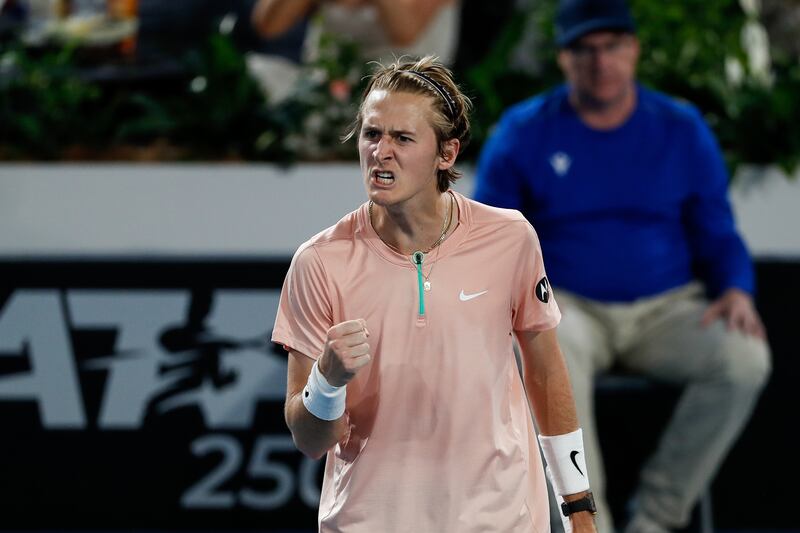 Sebastian Korda celebrates a point during the Adelaide International final against Novak Djokovic. EPA