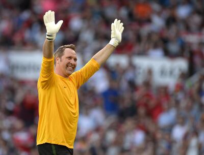 Former English international goalkeeper David Seaman warms up before the Soccer Aid celebrity football match between England and the Rest of the World at Old Trafford stadium in Manchester on June 5, 2016. (Photo by OLI SCARFF / AFP)