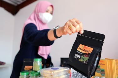 Small home-based entrepreneurs display their products at the Small Industry Business exhibition in Banda Aceh, Indonesia, 14 September 2022.  The Aceh government encourages small entrepreneurs to be able to market their products through the development of business networks at local to international levels in an effort to improve the economy of the lower middle class.   EPA / HOTLI SIMANJUNTAK