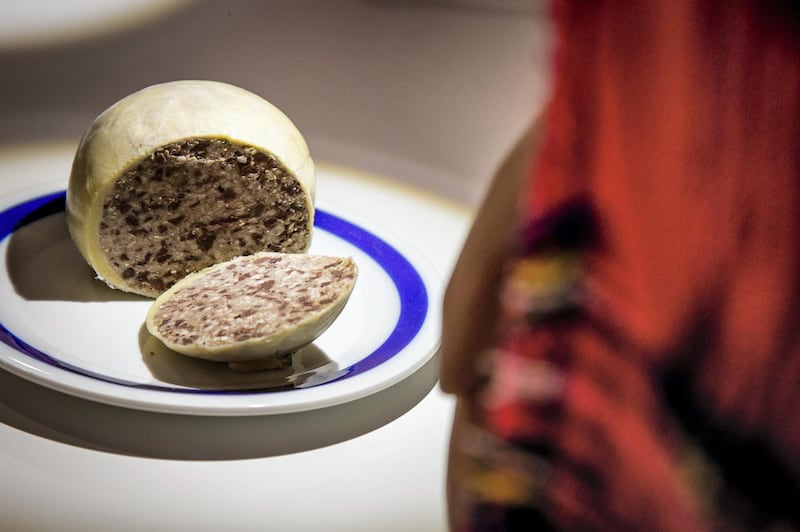Haggis from Scotland: a pudding made from the liver, heart, and lungs of  sheep, minced and mixed with beef or mutton seut and oatmeal, and seasoned with onion and spices. Traditionally, the mixture was packed into a sheep’s stomach and boiled Anja Barte Telin  