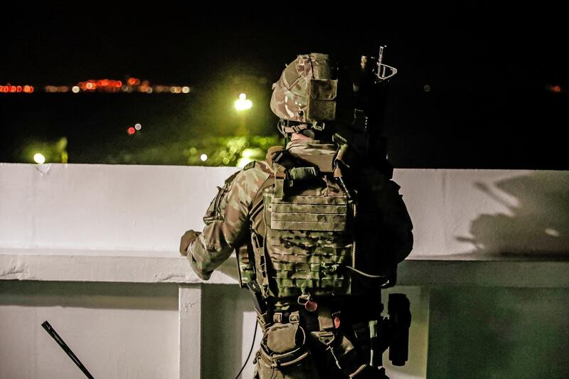 A British soldier looks on during an operation involving the oil supertanker Grace 1, that's on suspicion of carrying Iranian crude oil to Syria, in waters off the British overseas territory of Gibraltar, historically claimed by Spain, July 4, 2019. Picture taken July 4, 2019. Royal Marines from 42 Commando took part in its seizure. UK Ministry of Defence/Handout via REUTERS ATTENTION EDITORS - THIS IMAGE WAS PROVIDED BY A THIRD PARTY. NO RESALES. NO ARCHIVES.