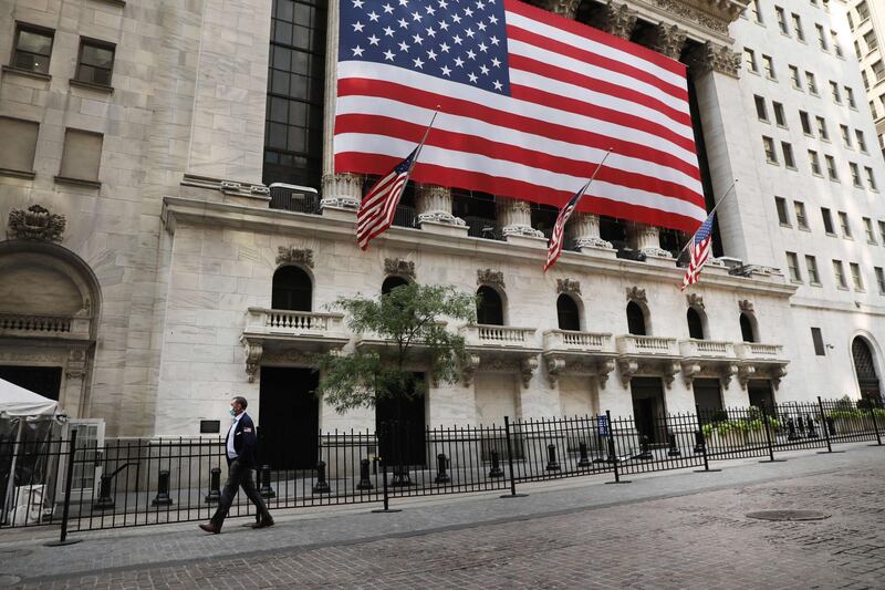 NEW YORK, NEW YORK - SEPTEMBER 21: A person walks in front of the New York Stock Exchange (NYSE) in lower Manhattan on September 21, 2020 in New York City. As parts of Europe prepare for another lockdown due to a resurgence in COVID-19 cases, markets across the globe fell due to the economic uncertainty. The Dow Jones Industrial Average fell over 900 points in morning trading.   Spencer Platt/Getty Images/AFP
== FOR NEWSPAPERS, INTERNET, TELCOS & TELEVISION USE ONLY ==
