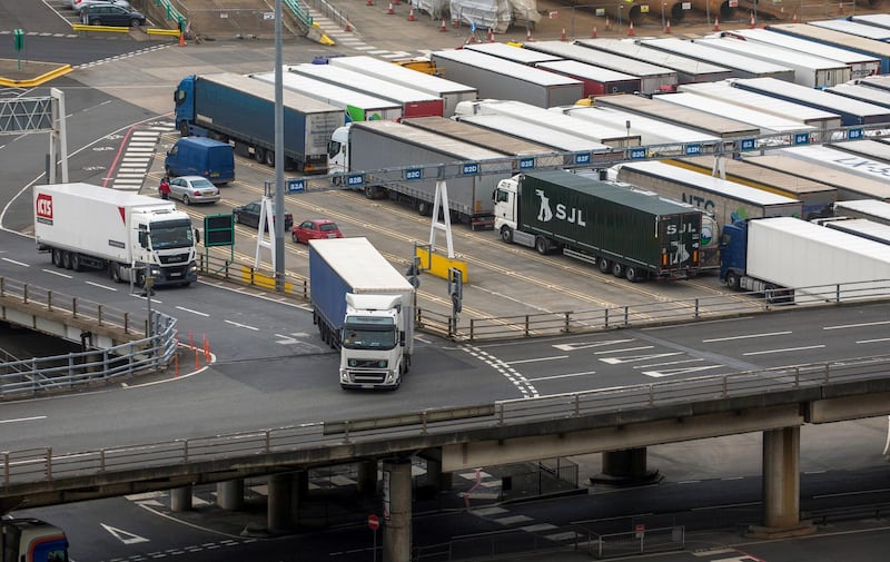 Trucks leave the Port of Dover Ltd. in Dover, U.K., on Thursday, April 1, 2021. The U.K. government has delayed, until Oct. 1, imposing post-Brexit checks on food imports coming from the European Union. Photographer: Chris Ratcliffe/Bloomberg