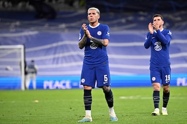 Chelsea's Argentinian midfielder Enzo Fernandez (L) and Chelsea's English midfielder Mason Mount applaud at the end of the UEFA Champions League quarter final first leg football match between Real Madrid CF and Chelsea FC at the Santiago Bernabeu stadium in Madrid on April 12, 2023.  - Real Madrid won 2-0.  (Photo by JAVIER SORIANO  /  AFP)