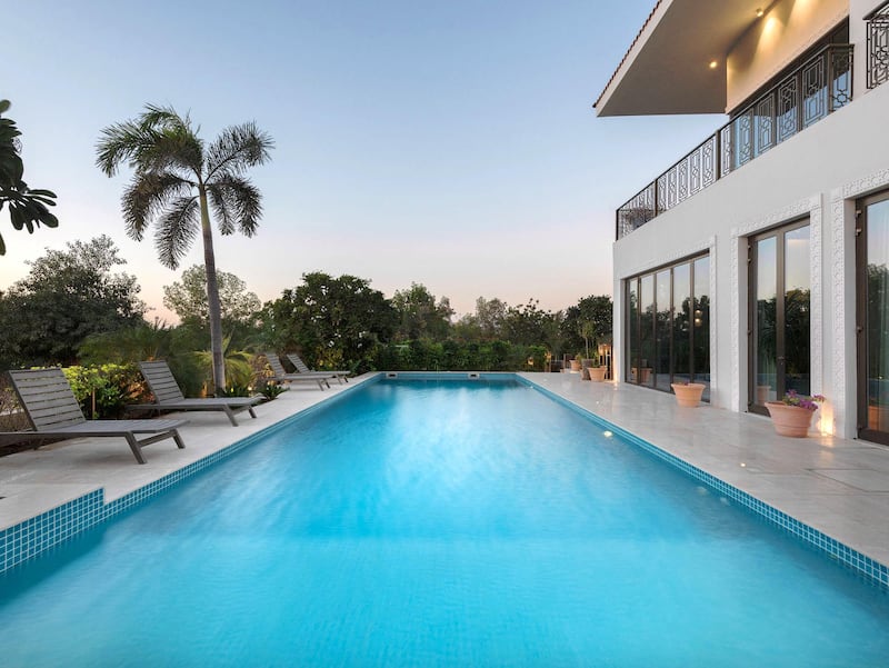 The pool runs along the back of the property. Courtesy Luxhabitat Sotheby's International Realty