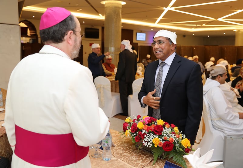 The gathering at Sikh gurdwara - or temple - in Dubai also served as an opportunity to welcome his successor, Bishop Paulo Martinelli, pictured on the left.