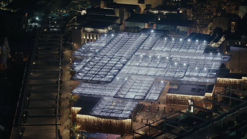 Opportunity Pavilion, one of three theme districts of Expo 2020 Dubai, lights up at night.