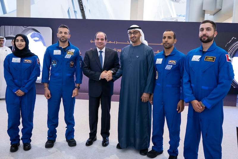 President Sheikh Mohamed and Mr El Sisi pose for a photo with UAE astronauts 