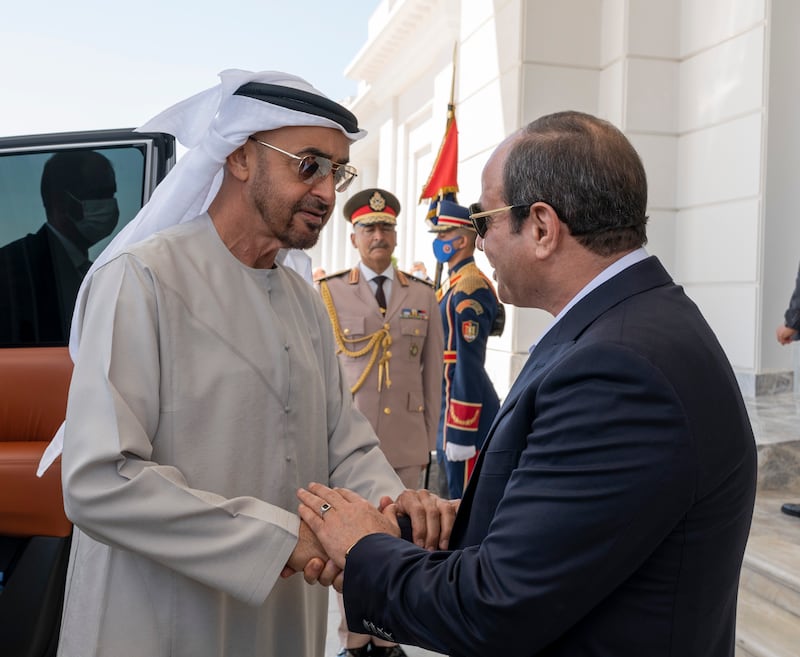 Sheikh Mohamed and Mr El Sisi exchange greetings. Mohamed Al Hammadi / UAE Presidential Court