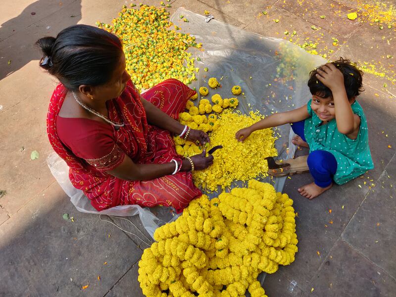 Several million tonnes of fresh flowers are sold every day at markets in India. Charukesi Ramadurai for The National