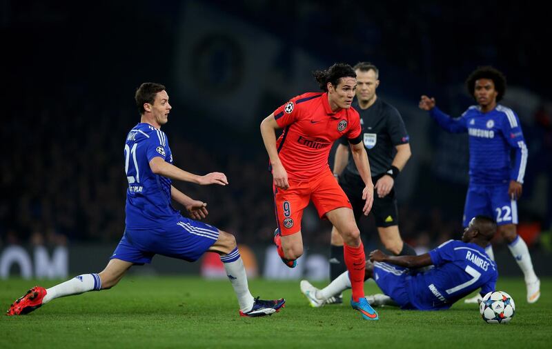 LONDON, ENGLAND - MARCH 11:  Edinson Cavani of PSG goes past the challenge from Nemanja Matic of Chelsea during the UEFA Champions League Round of 16, second leg match between Chelsea and Paris Saint-Germain at Stamford Bridge on March 11, 2015 in London, England.  (Photo by Paul Gilham/Getty Images)