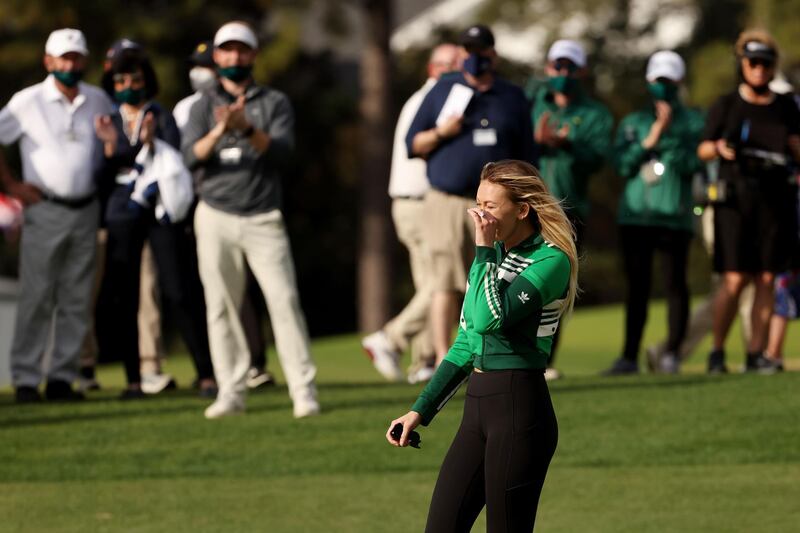 Paulina Gretzky, fiancée of Dustin Johnson, reacts on the 18th green. AFP