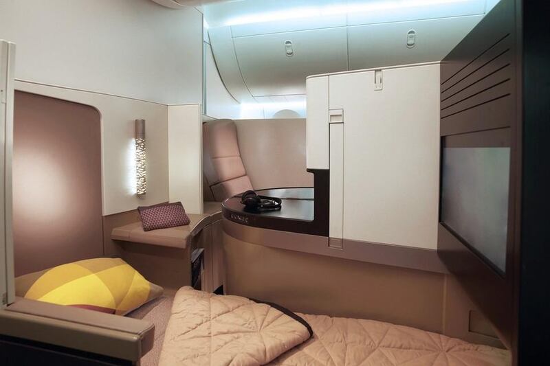 Above, a business studio aboard Etihad Airways with a bed that is adjustable. Courtesy Etihad Airways