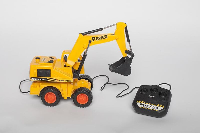 Excavator Racer — Small Dh30, Large Dh40

A sort of remote control construction truck but the controller is attached by a wire to the truck. That aside, it is decent value for money and does what it says on the box.