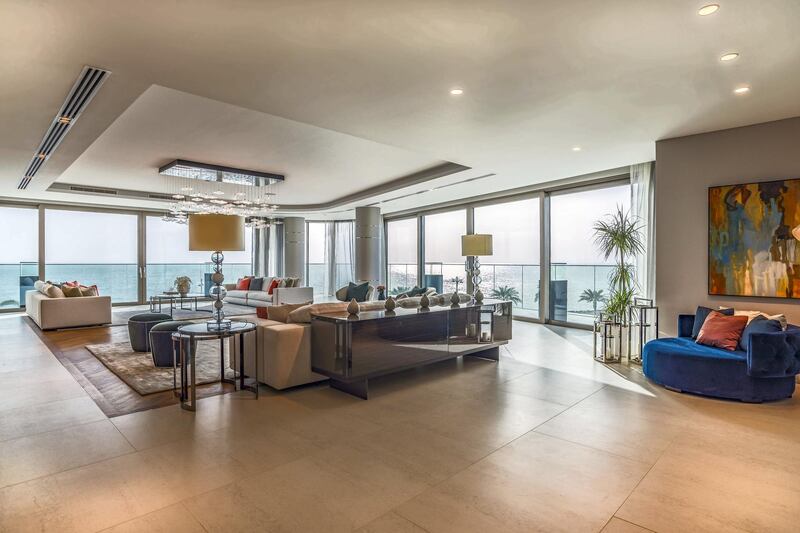 The open plan living provides sea views from many angles. Courtesy LuxuryProperty.com
