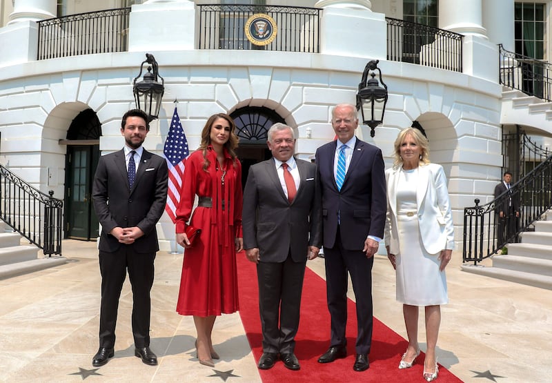 Jordan's King Abdullah II, centre, his wife Queen Rania, centre-left, Crown Prince Hussein bin Abdullah II, left, US President Joe Biden and the first lady Jill Biden, right, pose for a picture in Washington, DC