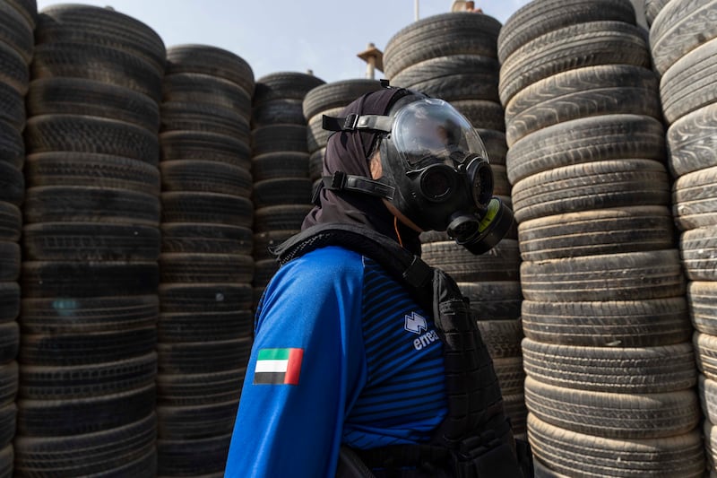 A team member wears a gas mask that can sometimes be used in operations


