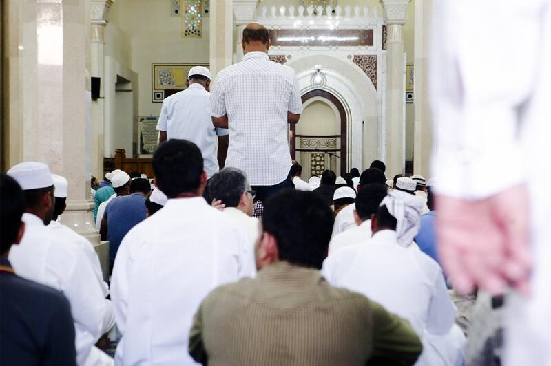 Worshippers pray inside of the Jumeirah Mosque in Dubai.

Lee Hoagland/The National