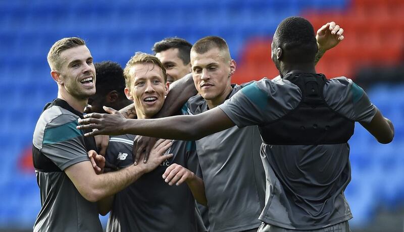 Liverpool’s Jordan Henderson, Lucas Leiva, Martin Skrtel and Christian Benteke during training. Dylan Martinez / Reuters