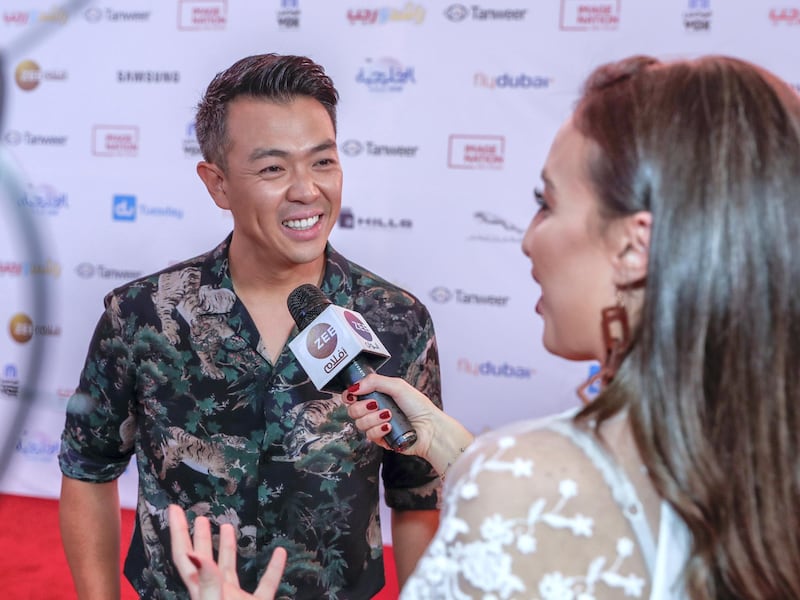 Dubai, United Arab Emirates, May 21, 2019.    Premiere of Image Nation’s latest, Rashid and Rajab.  Red carpet,  “celebs” and bigwigs. -- Wonho Chung as Medic)
is interviewed on the red carpet.
Victor Besa/The National
Section:  A&L
Reporter:  Chris Newbould